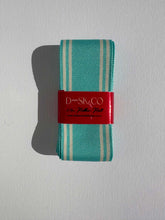 Load image into Gallery viewer, Striped grosgrain premium ribbon roll in a light blue colour with think white stripes on the edges. Add colour and style to your gift wrapping.
