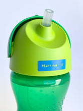 Load image into Gallery viewer, Kids&#39; green drinking bottle featuring a blue personalised kids&#39; permanent vinyl name labels for labelling their possessions. 
